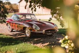 Image result for Maroon 1962 Jaguar