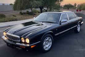 Image result for Ebony Black 2003 Jaguar