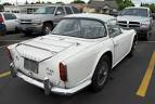 Old Parked Cars.: 1965 Triumph TR4A IRS.