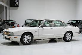Image result for White Onyx 2002 Jaguar
