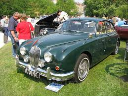 Image result for Dark Green 1959 Jaguar