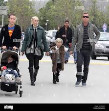 Image result for Queen B by Bumbleride $428 Gwen Stefani and Gavin Rossdale with Kingston and Zuma at the LA zoo