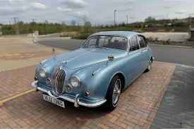 Image result for Light Blue 1968 Jaguar