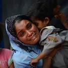 Stranded boat with Bangladeshi, Rohingya migrants finds nowhere to.