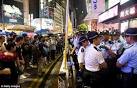 Hong Kong protesters attacked by shop owners as they are losing.