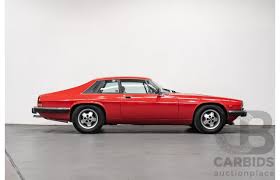 Image result for Sebring Red 1986 Jaguar