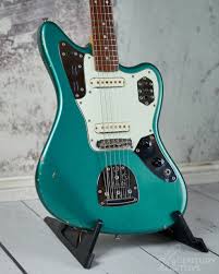 Image result for Turquoise 1973 Jaguar