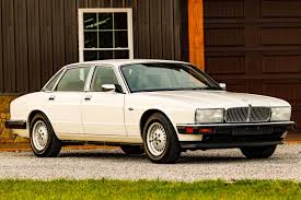 Image result for New Glacier White 1991 Jaguar