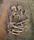 Embracing skeletons - Photo: Skeletons locked in eternal embrace ...