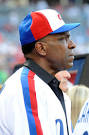 Andre Dawson Andre Dawson #10 gets emotional watching a video tribute before ...