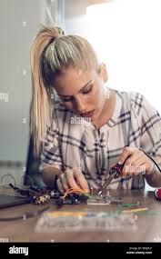 Image result for woman soldering