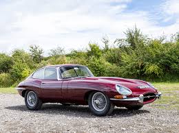 Image result for Maroon 1962 Jaguar