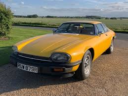 Image result for Carriage Brown 1977 Jaguar