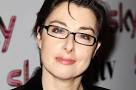 Sue Perkins jokes people think she is pregnant after scoffing.