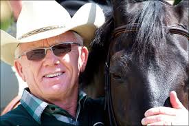 John Charlebois is a lifelong equestrian professional. At age seven, he began riding horses in Quebec, Canada, and has ridden hunters and jumpers since. - John_happy