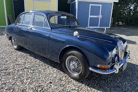Image result for Dark Blue 1965 Jaguar
