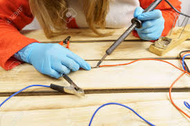 Image result for woman soldering