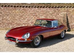 Image result for Maroon 1962 Jaguar