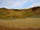 due to water seepage from inland rather than the direct action of waves - via Daymix