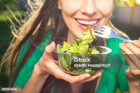 Image result for women eating salad and smiling