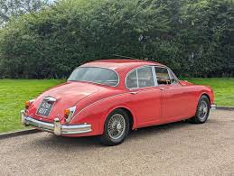 Image result for Carmen Red 1961 Jaguar