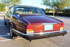 Image result for Burgundy 1983 Jaguar