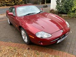 Image result for Carnival Red 1999 Jaguar