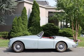 Image result for Silver Blue 1959 Jaguar