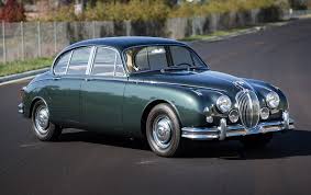 Image result for Silver Blue 1959 Jaguar