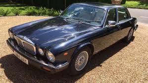 Image result for Black Cherry 1991 Jaguar