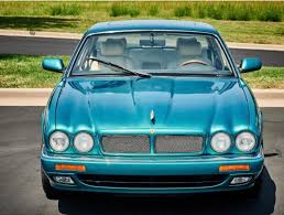 Image result for Bright Turquoise 1995 Jaguar