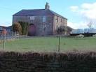 near to Dunnockshaw, Lancashire, Great Britain. Farmhouse in Love Clough - via Daymix