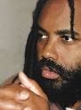 Mumia Abu-Jamal, speaks