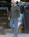 Bradley Cooper on AMERICAN SNIPER set with co-star Sienna Miller.
