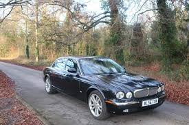 Image result for Black Cherry 2006 Jaguar