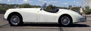 Image result for Old English White 1955 Jaguar