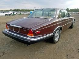 Image result for Burgundy 1983 Jaguar