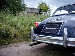 Image result for Silver Blue 1959 Jaguar