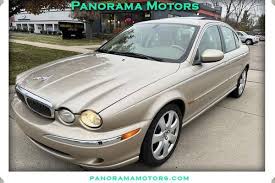 Image result for Winter Gold Pearl 2007 Jaguar