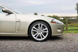 Image result for Winter Gold Pearl 2007 Jaguar