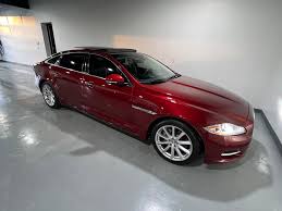 Image result for Carnelian Red 1979 Jaguar