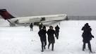 BBC News - Plane skids off New York runway during snow storm