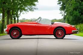 Image result for Carmen Red 1961 Jaguar