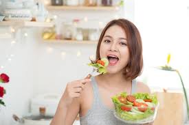 Image result for women eating salad and smiling