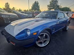 Image result for Quartz Blue 1980 Jaguar