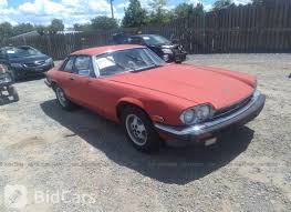 Image result for Sebring Red 1986 Jaguar