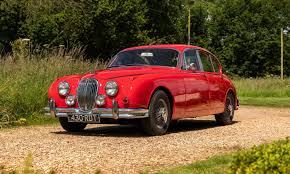 Image result for Carmen Red 1961 Jaguar