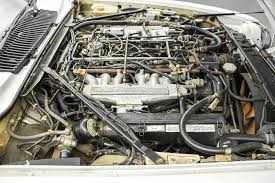 Image result for Glacier White 1989 Jaguar