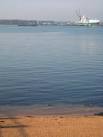 At the head of the old Royal Pier, looking across the river to docks at - via Daymix