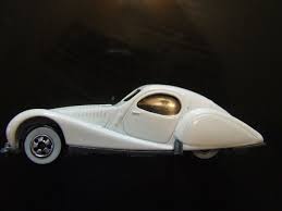 Image result for Nimbus White 1987 Jaguar